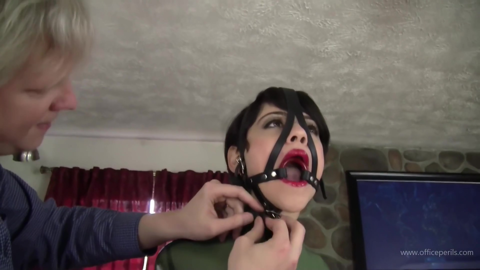 Ring Gagged Latex Drooler
