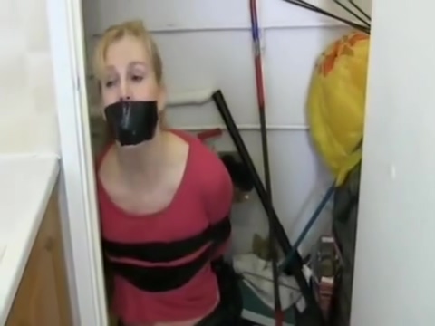 blonde duct taped in her kitchen
