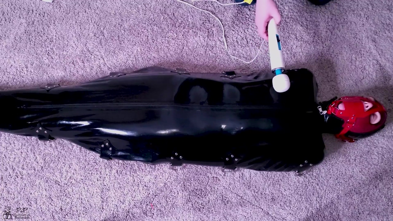 Tiny Slut Is Muzzle Gagged Then Locked In A Latex Sack & Made To Cum On A Magic Wand!
