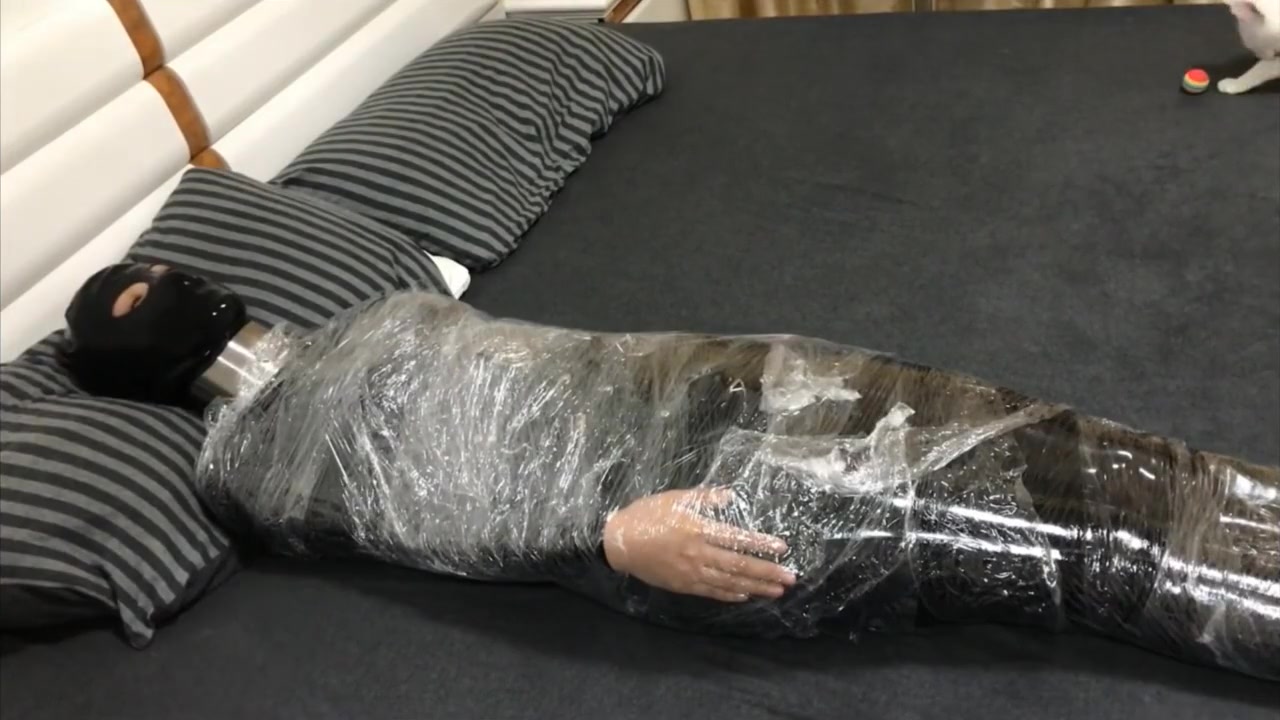 Mummified and Vibed In Latex Suit -- Trailer
