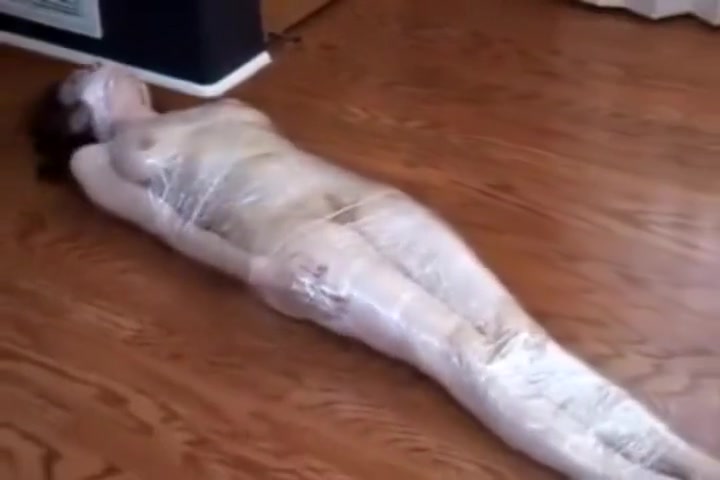 Plasticwrapped mummified girl
