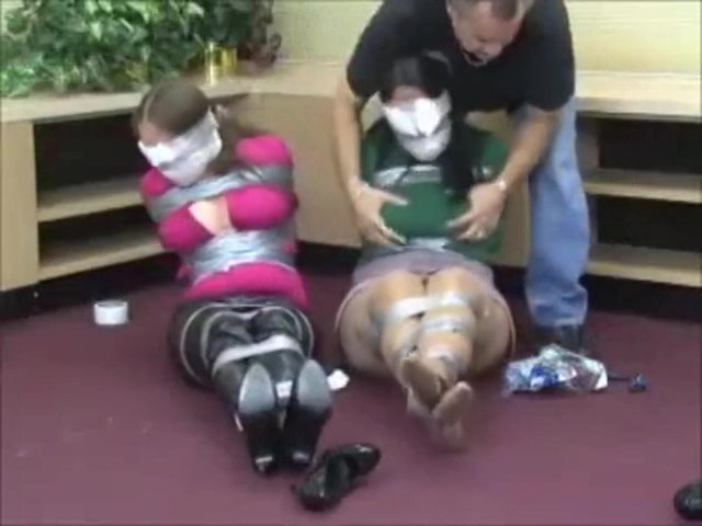 Two Tied Girls are Gagged and Blindfolded
