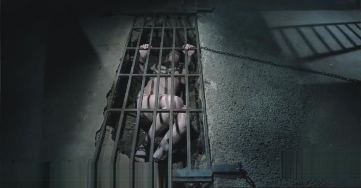 Dungeon BDSM Slave Chained in a Hole
