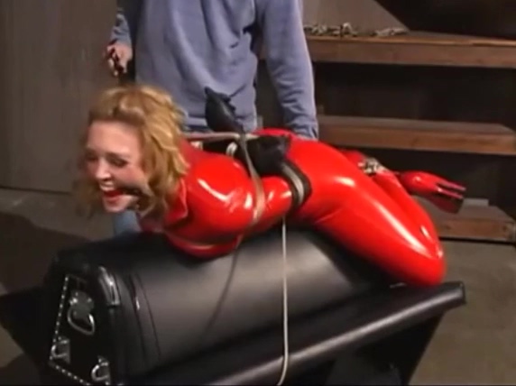 Hogtied &_ Spanked in Red Catsuit
