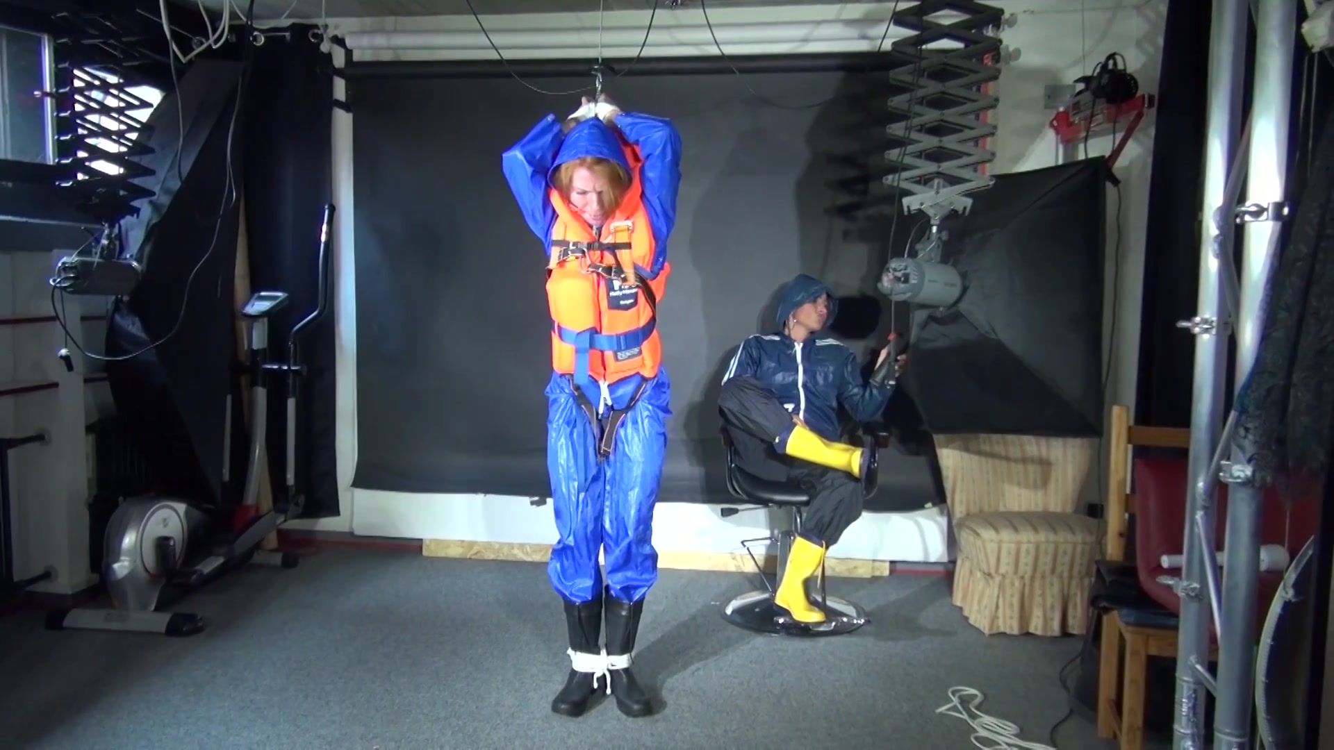 See Ronja Tied And Gagged By Stella In Shiny Nylon Rainwear And A Life Vest!
