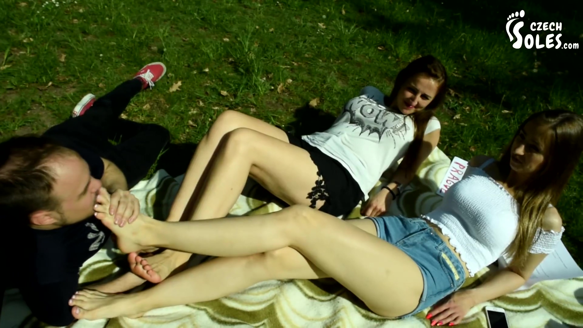 Two Barefoot Girls In Park Having Their Feet Worshiped By A Stranger (foot Worship Public Feet)
