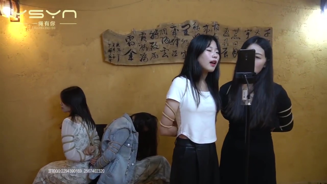 Four Girls Tied Up Singing
