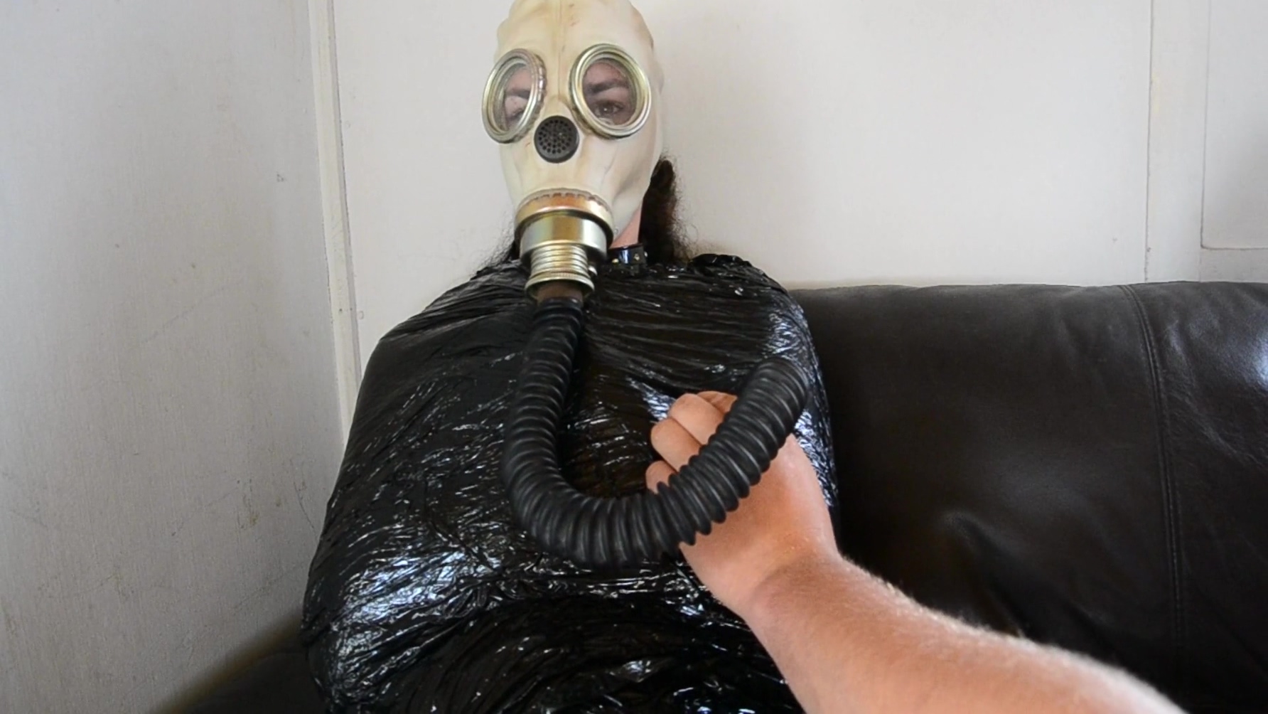 Plastic Bondage Gasmasked Girl
